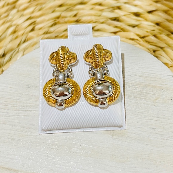 Monet Jewelry - Vintage MONET designer dangle pierced earrings, with a gold silver tone finish